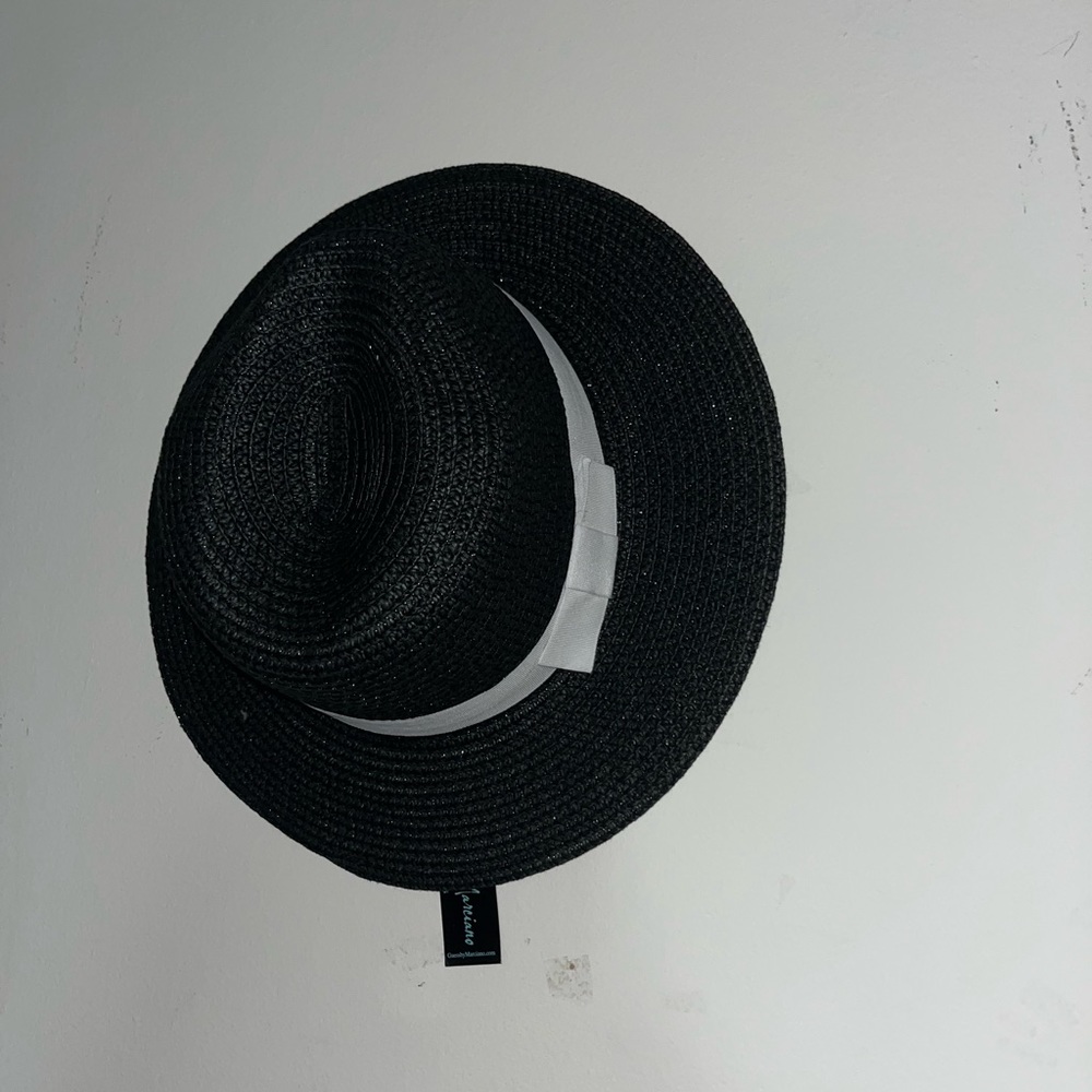 black women hat with white ribbon